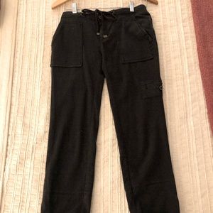 Dappled gray joggers with zipper, top button, and drawstring. Dress up or casual